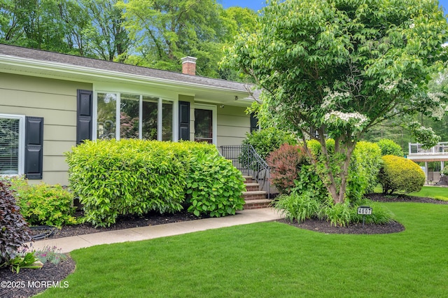 4607 Broad St, Wall, NJ 07753 - view of front of property with a chimney and a front yard