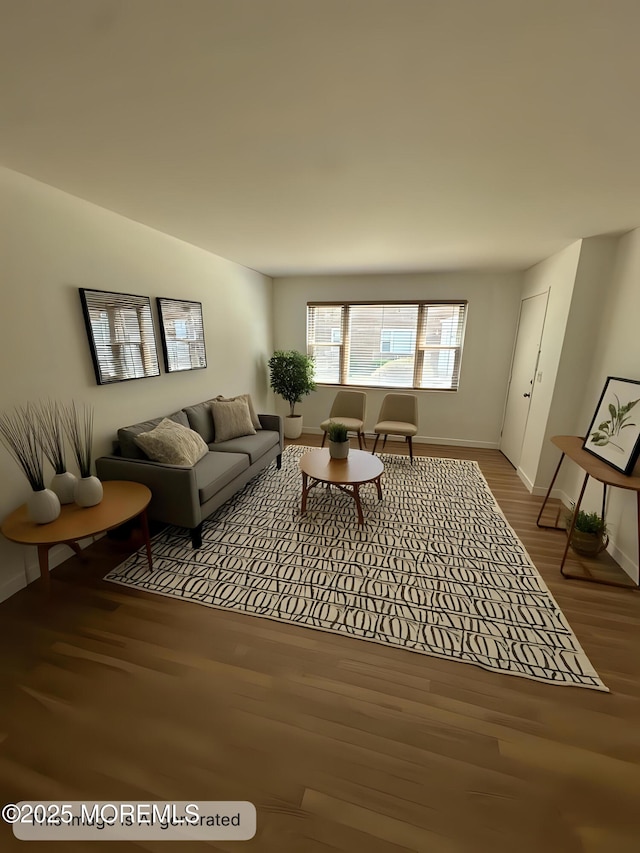 66 Fox Rd Unit 10A, Edison, NJ 08817 - living room featuring wood finished floors and baseboards