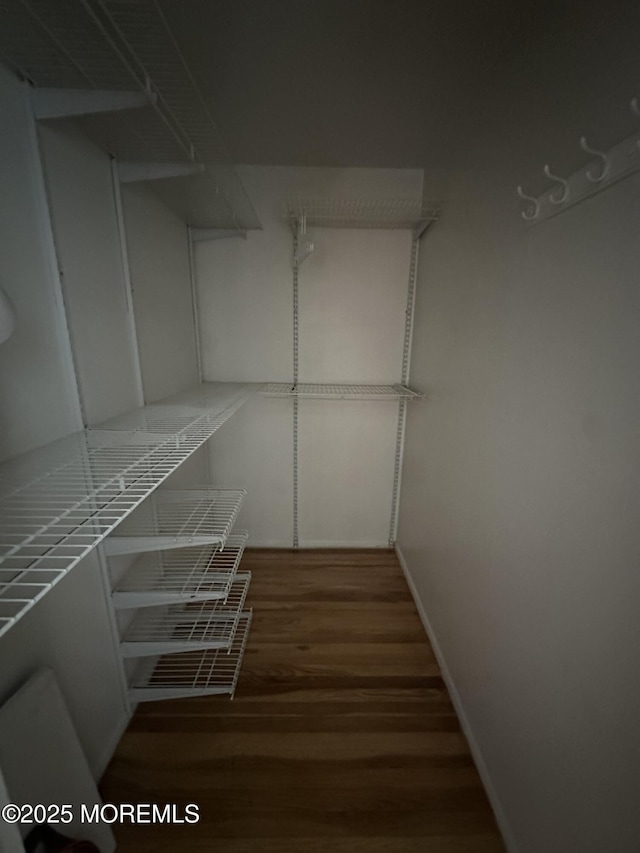 66 Fox Rd Unit 10A, Edison, NJ 08817 - walk in closet featuring wood finished floors