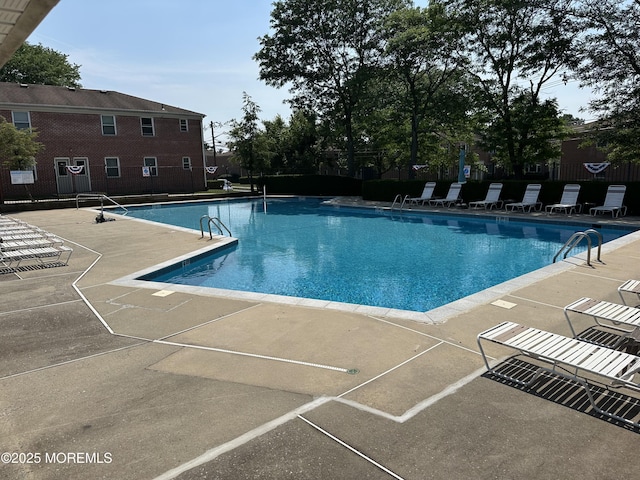 66 Fox Rd Unit 10A, Edison, NJ 08817 - community pool with a patio area