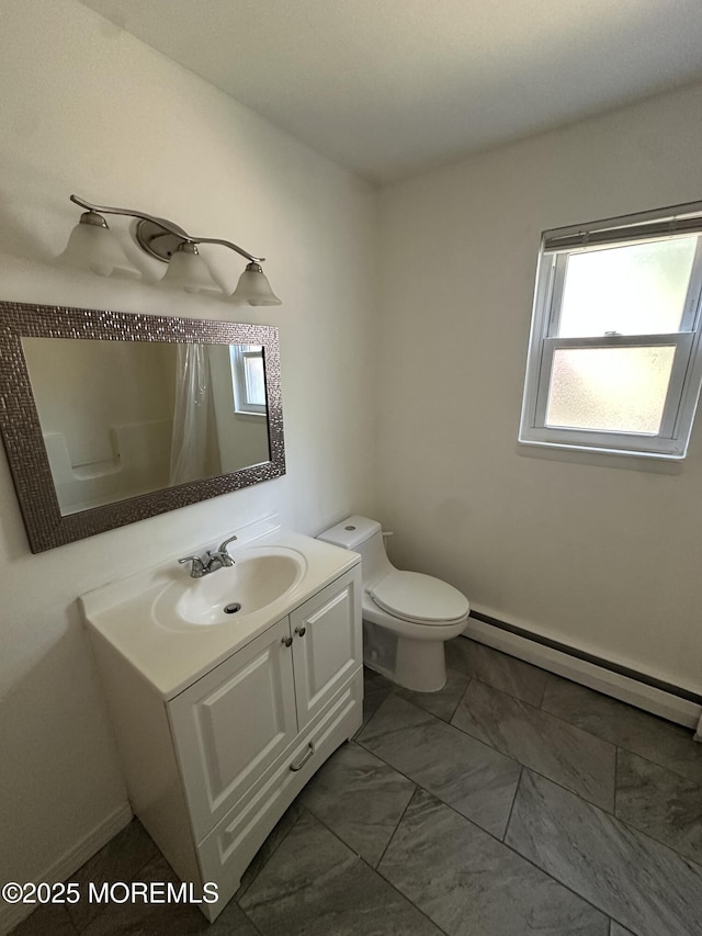 66 Fox Rd Unit 10A, Edison, NJ 08817 - bathroom featuring a baseboard radiator, plenty of natural light, vanity, and curtained shower
