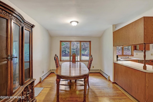 192 Crescent Ave, Jackson, NJ 08527 - dining space with a baseboard heating unit and light wood-type flooring