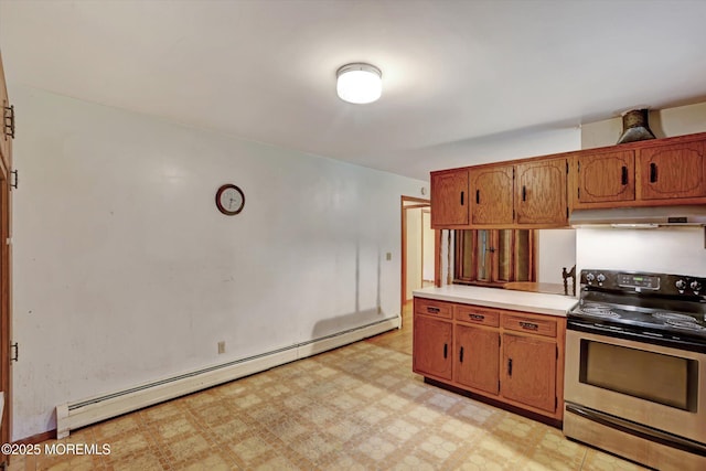192 Crescent Ave, Jackson, NJ 08527 - kitchen featuring stainless steel electric range, under cabinet range hood, baseboard heating, light countertops, and brown cabinetry
