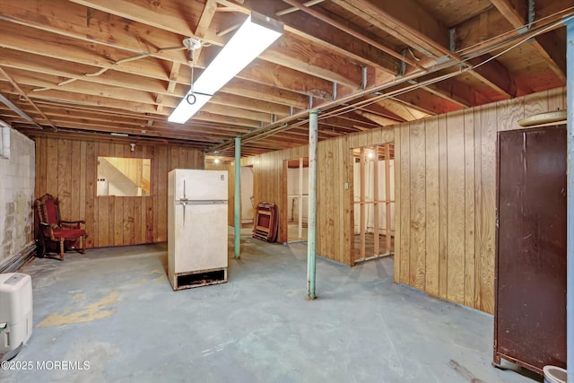 192 Crescent Ave, Jackson, NJ 08527 - unfinished below grade area with freestanding refrigerator and wood walls