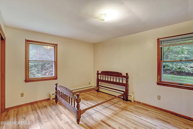 192 Crescent Ave, Jackson, NJ 08527 - bedroom with a baseboard radiator and light wood finished floors