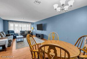 1263 Hamilton Ct Unit B, Lakewood, NJ 08701 - dining area with a chandelier and wood finished floors