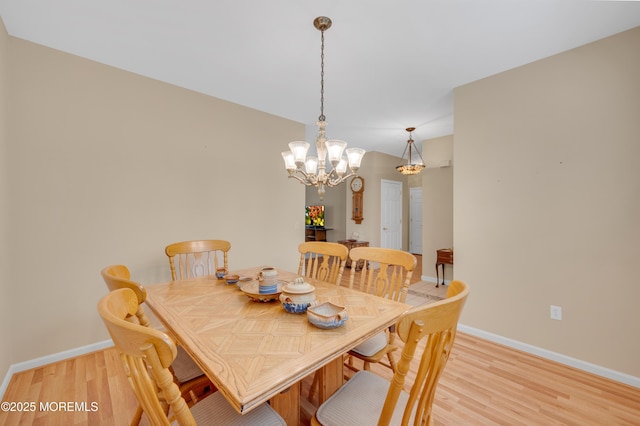 52 Country Walk Blvd, Whiting, NJ 08759 - dining area with light wood-style floors and a chandelier