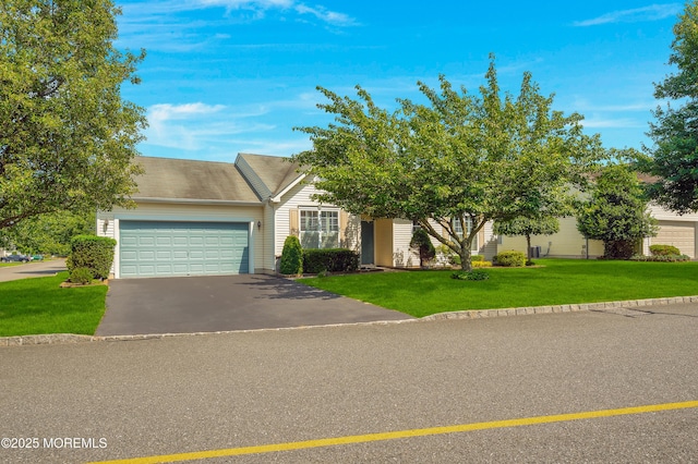 52 Country Walk Blvd, Whiting, NJ 08759 - obstructed view of property featuring an attached garage, asphalt driveway, and a front lawn