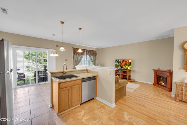 52 Country Walk Blvd, Whiting, NJ 08759 - kitchen featuring stainless steel dishwasher, freestanding refrigerator, healthy amount of natural light, and open floor plan