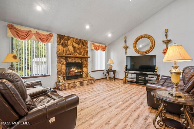 236 Community Cir, Old Bridge, NJ 08857 - living room featuring vaulted ceiling, wood finished floors, recessed lighting, and a fireplace