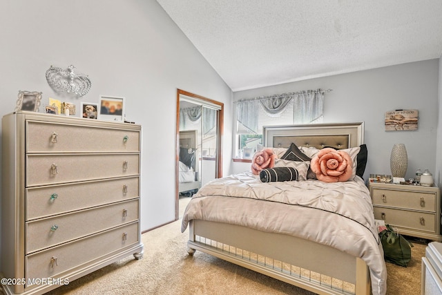 236 Community Cir, Old Bridge, NJ 08857 - bedroom featuring light colored carpet, lofted ceiling, and a textured ceiling