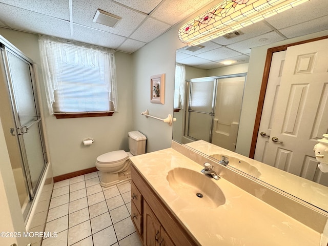 219 Newark Rd S, Barnegat, NJ 08005 - bathroom with a paneled ceiling, an enclosed shower, vanity, and tile patterned flooring