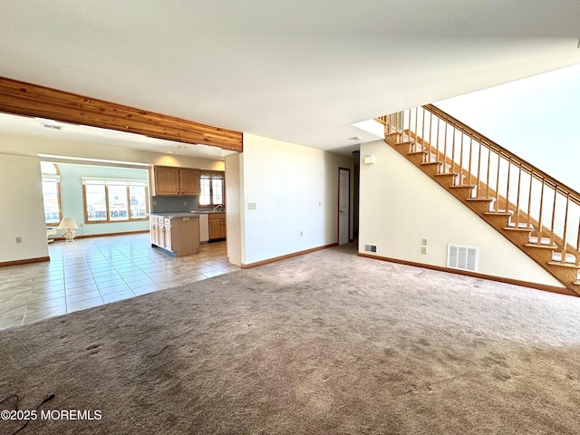 219 Newark Rd S, Barnegat, NJ 08005 - unfurnished living room with stairs, light carpet, and light tile patterned floors