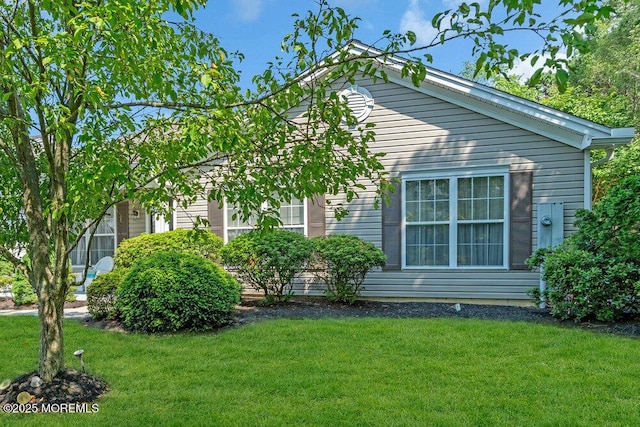 44 Autumntide Dr, Lakewood, NJ 08701 - view of property exterior with a yard