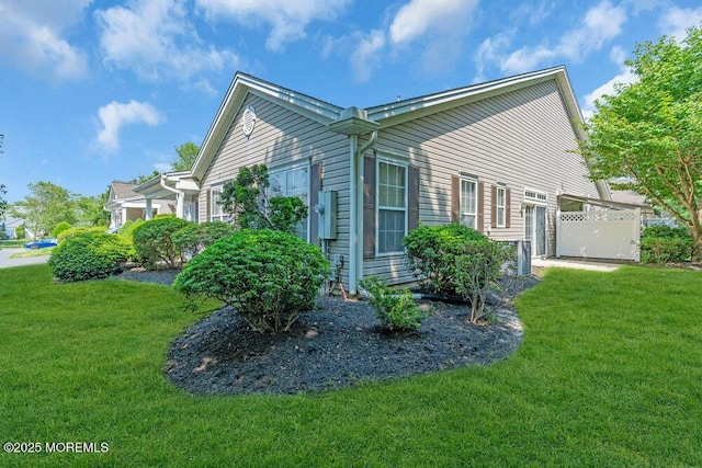 44 Autumntide Dr, Lakewood, NJ 08701 - view of side of property with a lawn