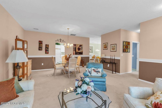 44 Autumntide Dr, Lakewood, NJ 08701 - living room with a chandelier and carpet