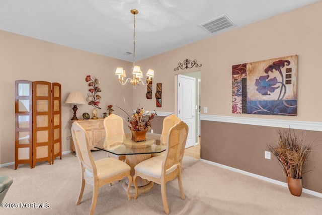 44 Autumntide Dr, Lakewood, NJ 08701 - dining space with a chandelier and light carpet