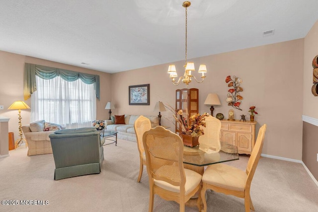 44 Autumntide Dr, Lakewood, NJ 08701 - dining room with light carpet and a chandelier