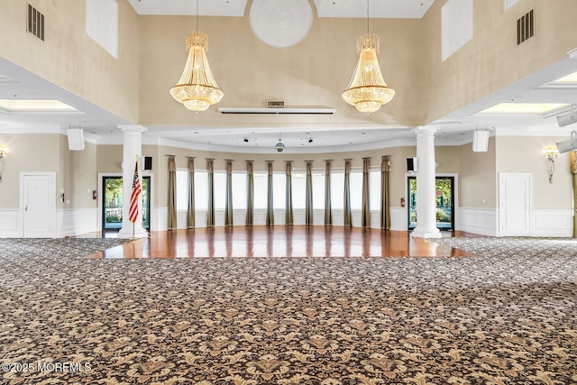 44 Autumntide Dr, Lakewood, NJ 08701 - community lobby with a high ceiling, a decorative wall, ornamental molding, and a wainscoted wall