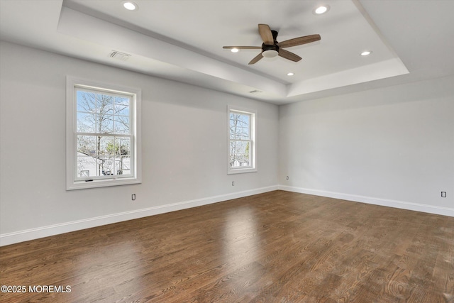 413B Lake Shr, Brick, NJ 08723 - spare room with a tray ceiling, plenty of natural light, a ceiling fan, recessed lighting, and dark wood-style floors