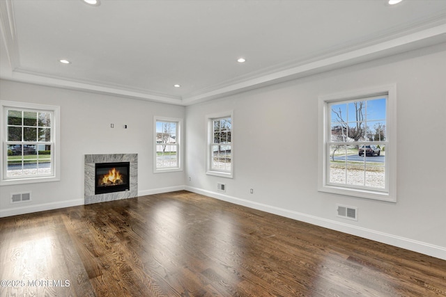 413B Lake Shr, Brick, NJ 08723 - unfurnished living room with a tray ceiling, plenty of natural light, a fireplace, recessed lighting, and crown molding
