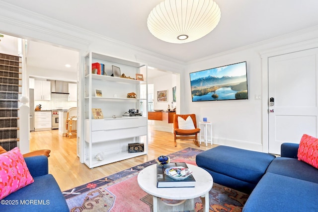 13031/2 Langford St, Asbury Park, NJ 07712 - living area with ornamental molding, stairway, and light wood-type flooring
