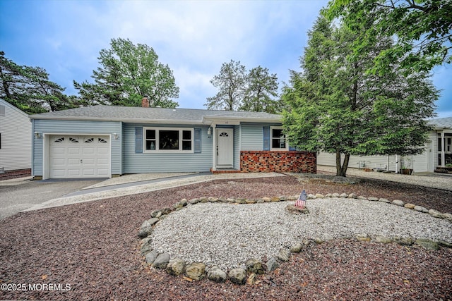 48 Sheepshead Dr, Toms River, NJ 08757 - ranch-style home with an attached garage, driveway, and a chimney