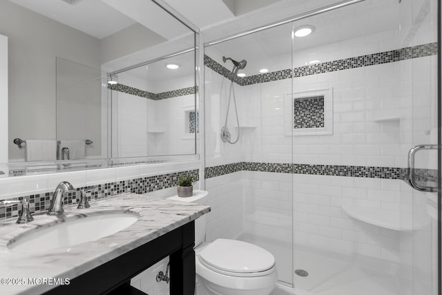 7 Navesink Ct, Long Branch, NJ 07740 - bathroom featuring vanity, a stall shower, and tasteful backsplash