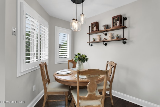 7 Navesink Ct, Long Branch, NJ 07740 - dining area with baseboards and dark wood-style flooring