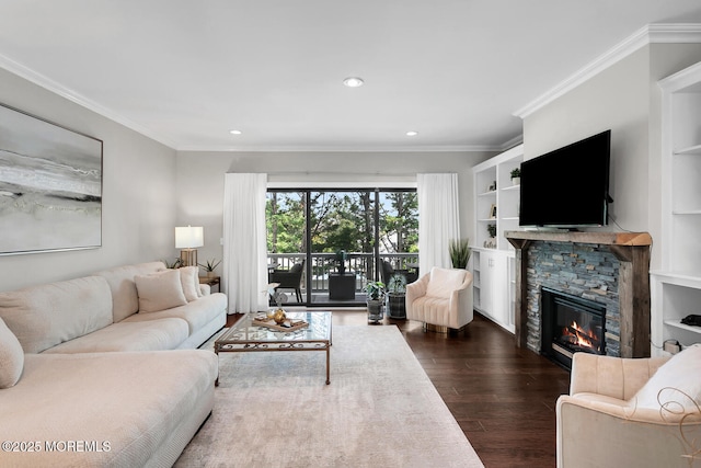 7 Navesink Ct, Long Branch, NJ 07740 - living area with dark wood-type flooring, a stone fireplace, recessed lighting, and crown molding