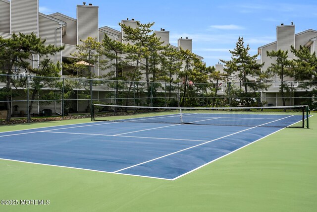 7 Navesink Ct, Long Branch, NJ 07740 - view of tennis court featuring community basketball court
