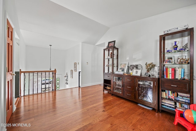 104 Starlight Rd, Howell, NJ 07731 - living area featuring lofted ceiling and wood finished floors