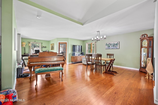 104 Starlight Rd, Howell, NJ 07731 - dining area featuring plenty of natural light, a chandelier, and wood finished floors
