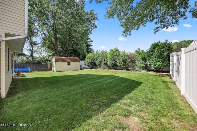 104 Starlight Rd, Howell, NJ 07731 - fenced backyard featuring a storage shed