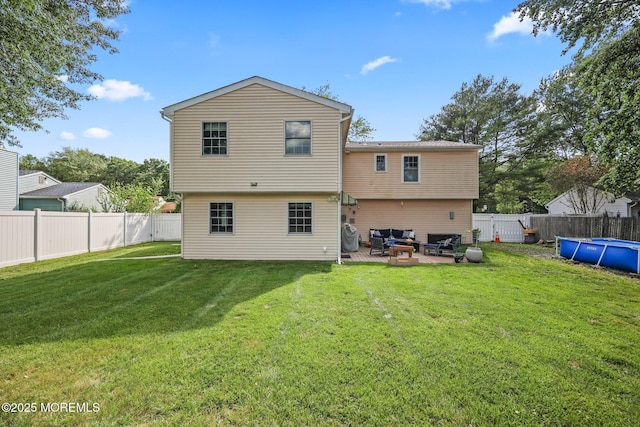 104 Starlight Rd, Howell, NJ 07731 - rear view of house featuring a fenced backyard, outdoor lounge area, and a patio