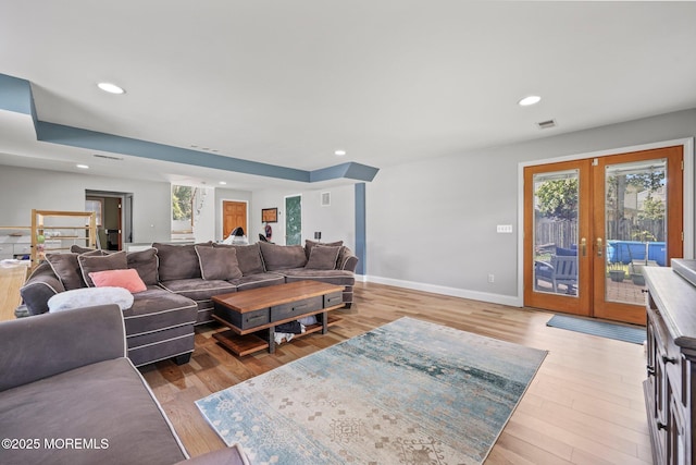 104 Starlight Rd, Howell, NJ 07731 - living room featuring wood finished floors, french doors, and recessed lighting