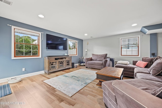 104 Starlight Rd, Howell, NJ 07731 - living room with plenty of natural light, wood finished floors, and recessed lighting