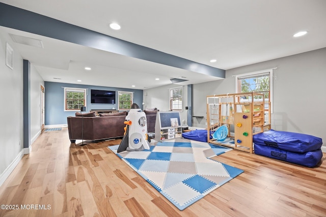 104 Starlight Rd, Howell, NJ 07731 - workout room featuring wood finished floors, recessed lighting, and healthy amount of natural light