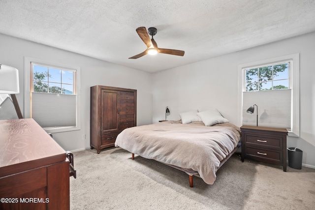 104 Starlight Rd, Howell, NJ 07731 - bedroom with multiple windows, light carpet, a textured ceiling, and ceiling fan