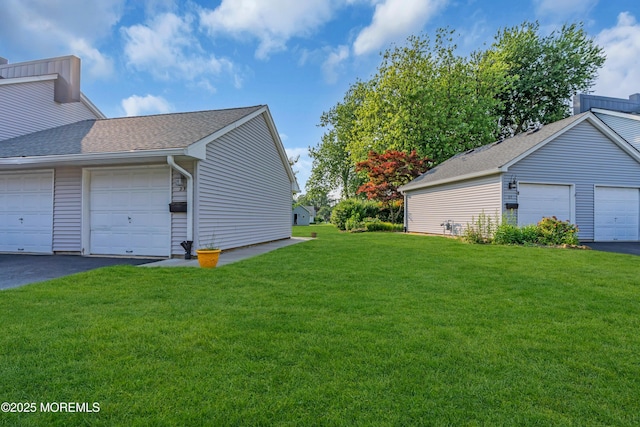 23 Arlene Ct Unit 4103, Brick, NJ 08723 - view of property exterior featuring a yard and roof with shingles
