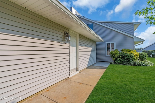 23 Arlene Ct Unit 4103, Brick, NJ 08723 - view of exterior entry featuring a yard