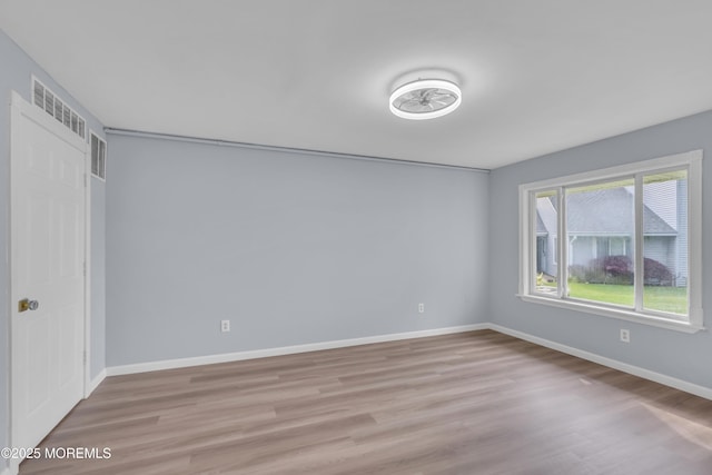 23 Arlene Ct Unit 4103, Brick, NJ 08723 - empty room with light wood finished floors