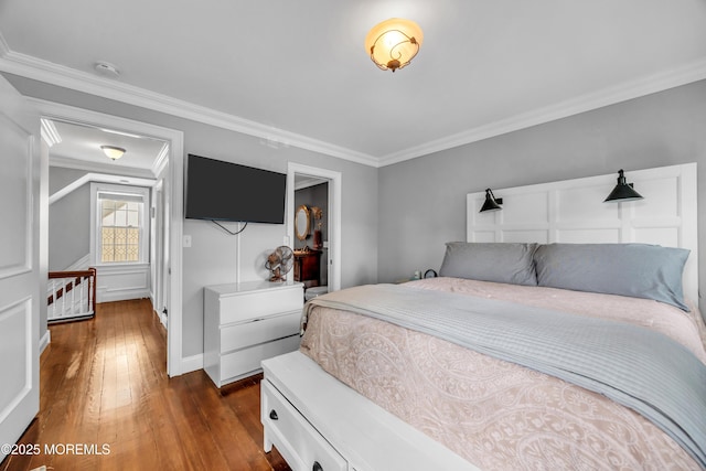 1108 Emory St, Asbury Park, NJ 07712 - bedroom with dark wood finished floors and ornamental molding
