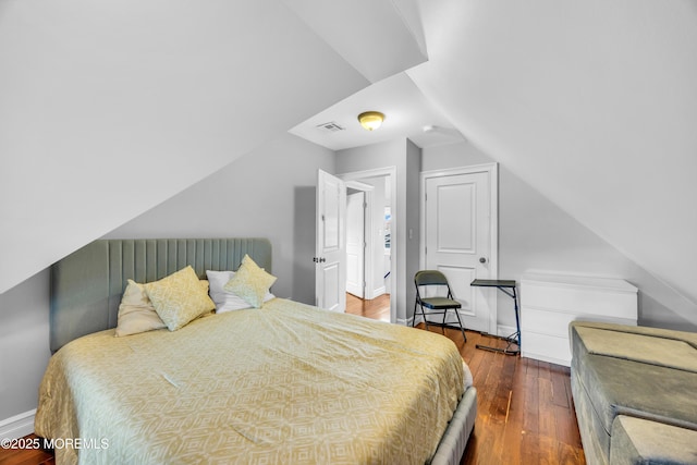 1108 Emory St, Asbury Park, NJ 07712 - bedroom with hardwood / wood-style flooring and vaulted ceiling