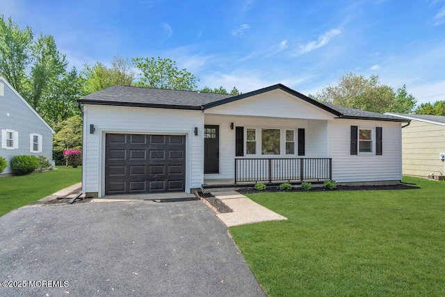 9 Westbrook Dr, Toms River, NJ 08757 - ranch-style house featuring covered porch, an attached garage, asphalt driveway, and a front yard
