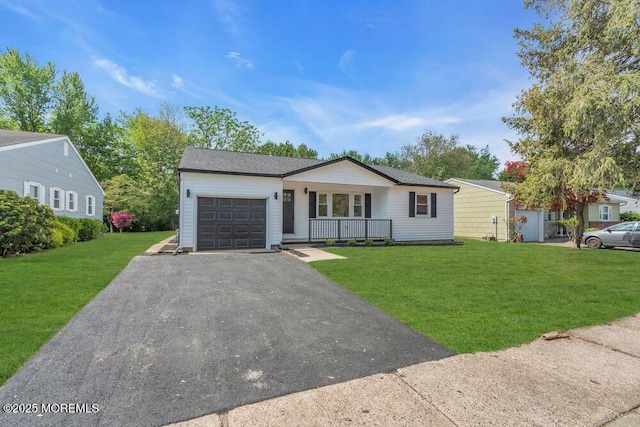 9 Westbrook Dr, Toms River, NJ 08757 - ranch-style house featuring covered porch, an attached garage, asphalt driveway, and a front lawn