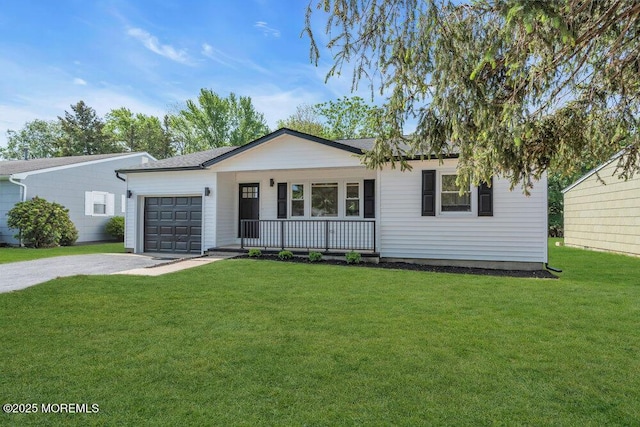 9 Westbrook Dr, Toms River, NJ 08757 - ranch-style home featuring covered porch, driveway, an attached garage, and a front yard
