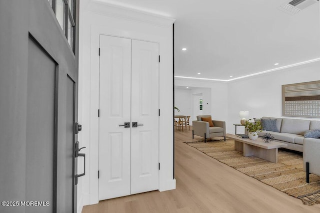 9 Westbrook Dr, Toms River, NJ 08757 - living area featuring light wood-style flooring, recessed lighting, and ornamental molding