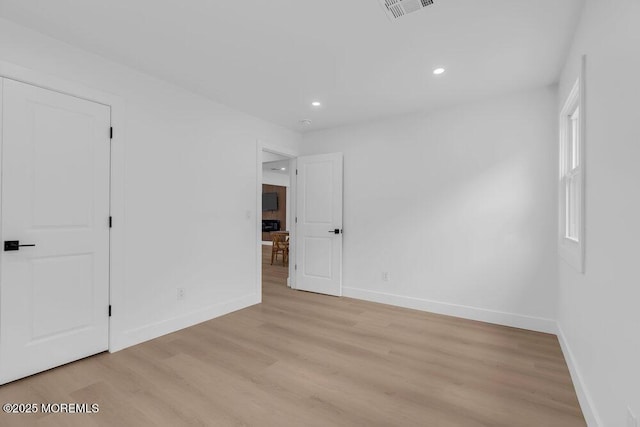 9 Westbrook Dr, Toms River, NJ 08757 - unfurnished bedroom featuring light wood-style flooring and recessed lighting