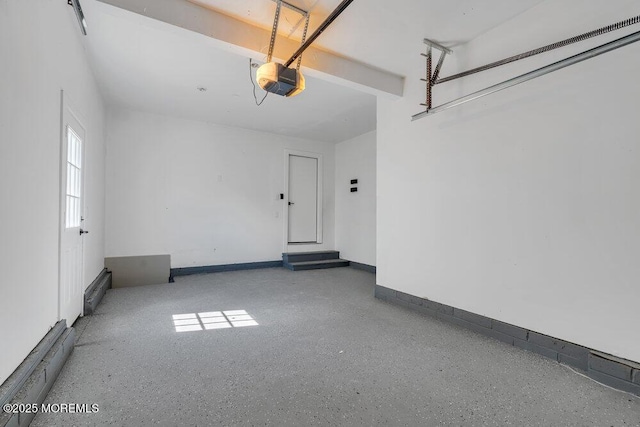 9 Westbrook Dr, Toms River, NJ 08757 - garage with a garage door opener and baseboards